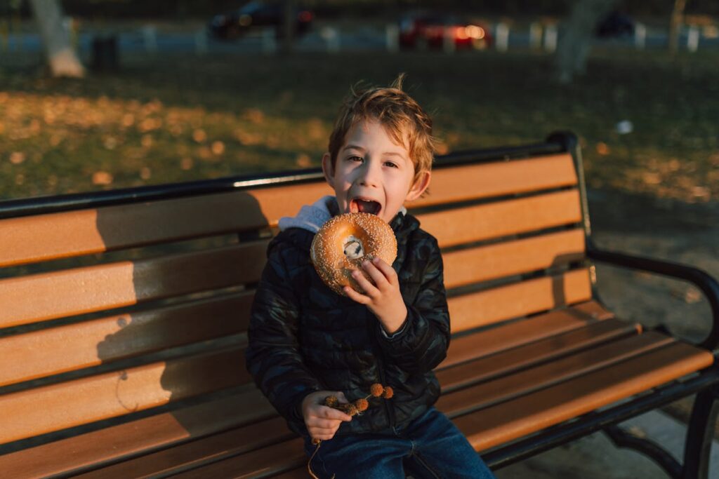 kid eating bagel